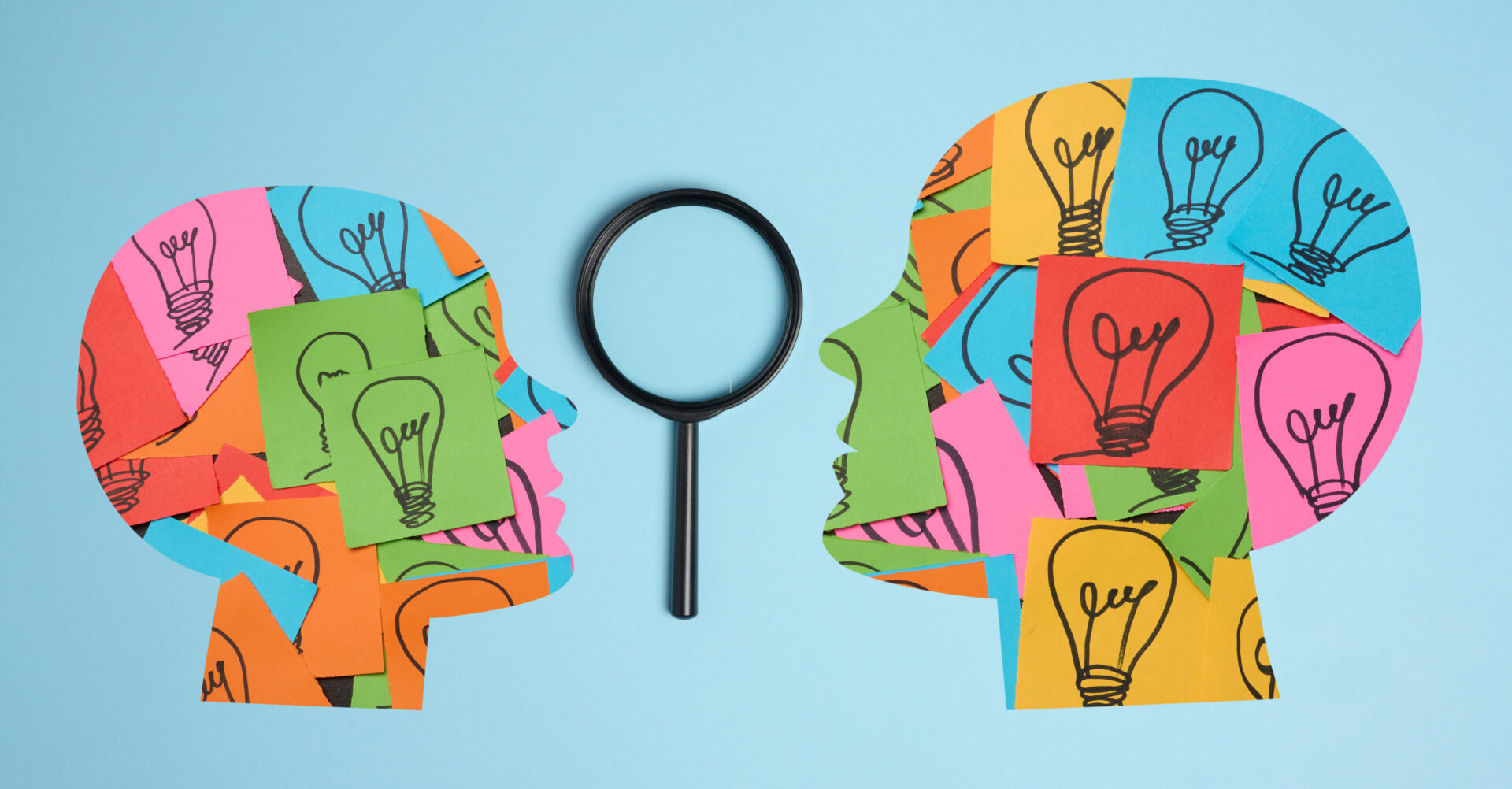 Silhouette of a human head and stickers with drawn electric lamp